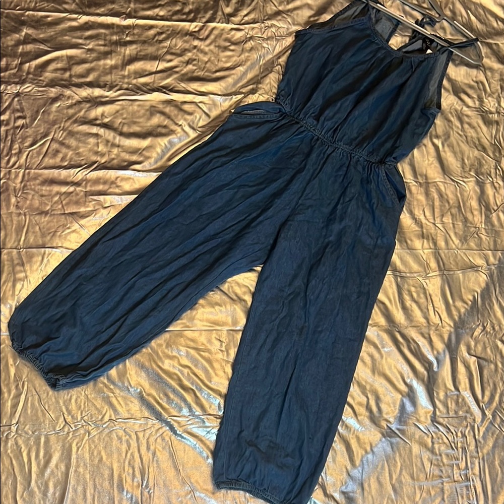 Love Blue Sleeveless Jumpsuit with V-Neckline